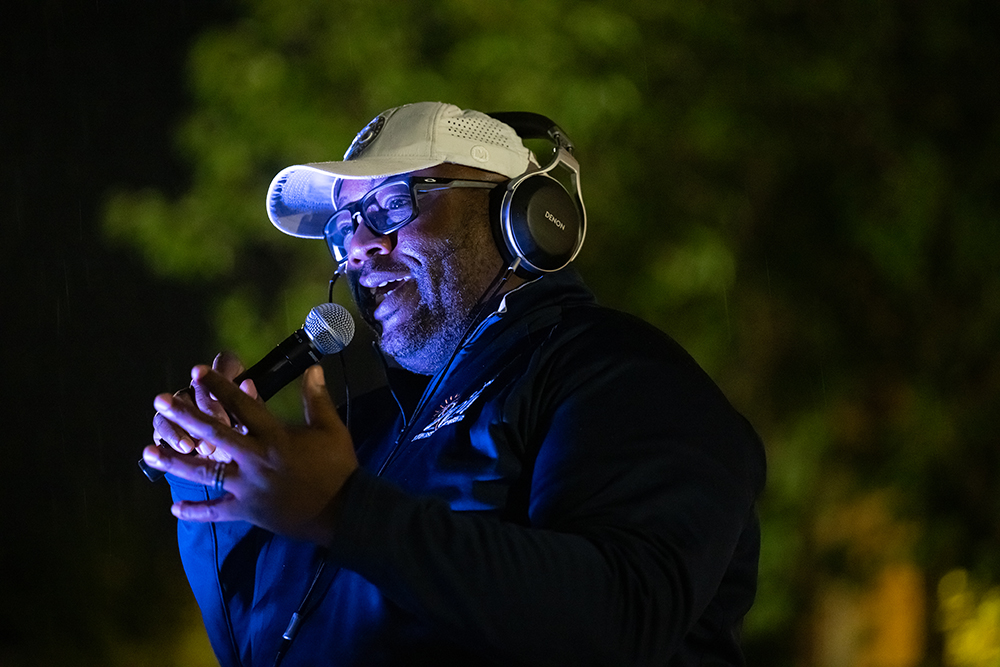 University vice president for student life John Blackshear DJs. Students of the University of Rochester class of 2028 attend the Candlelight Ceremony.