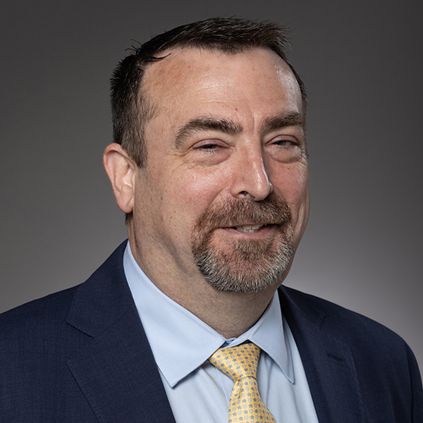 Headshot of James Kellenberger.